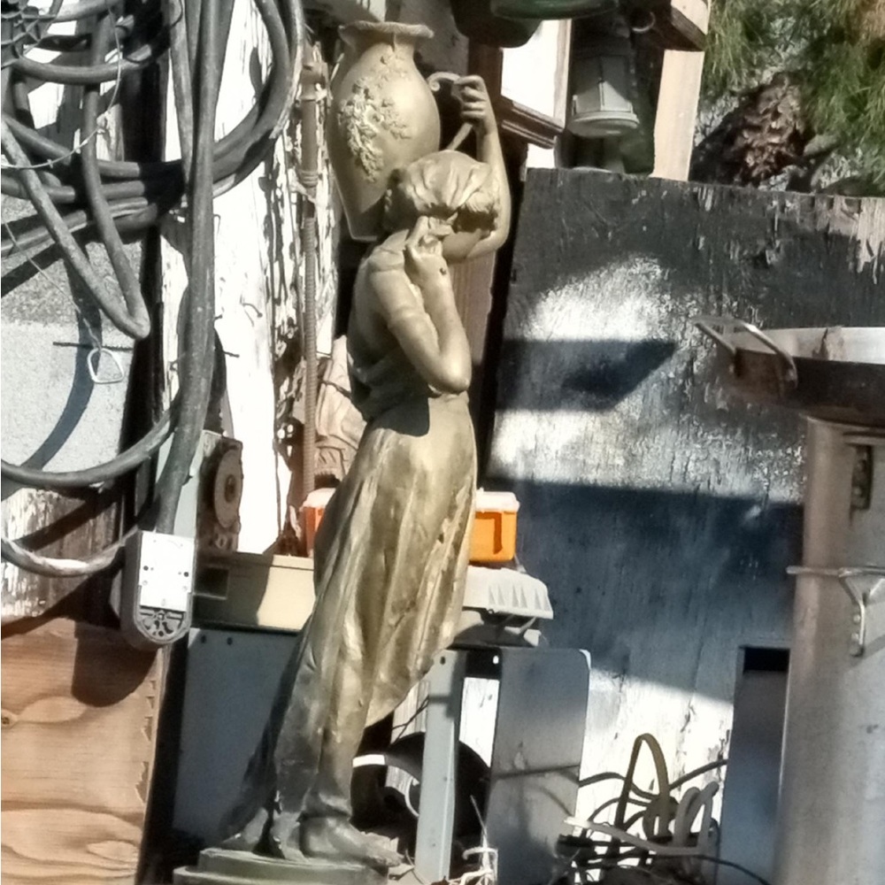 Goddess holding a vessel base bronze